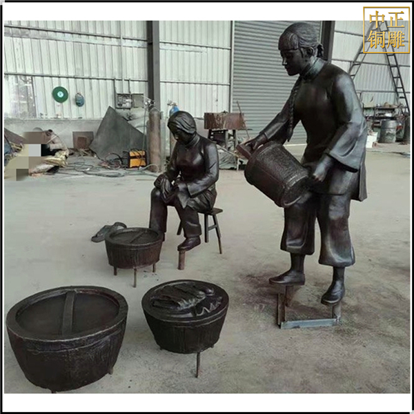 打水洗衣服人物雕塑